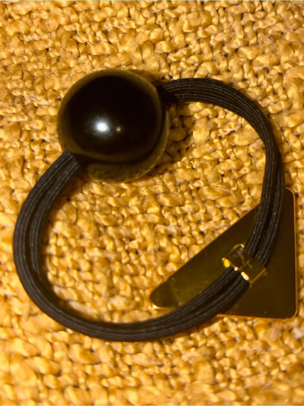 Prada Black and Gold Triangle Logo Hair Tie